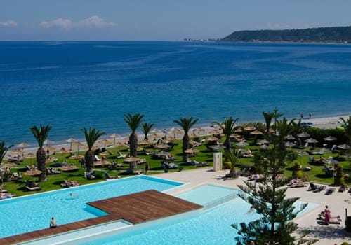 Main pool and beachfront at the Ixian Grand & All Suites in Ixia, Rhodes.